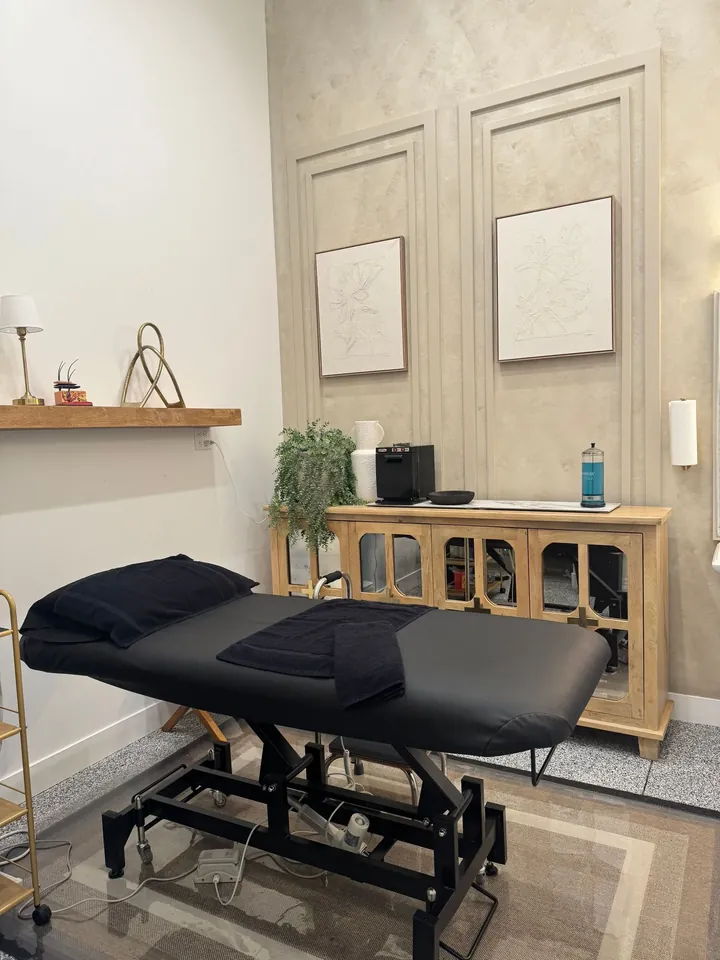 A private treatment room with soft neutral walls